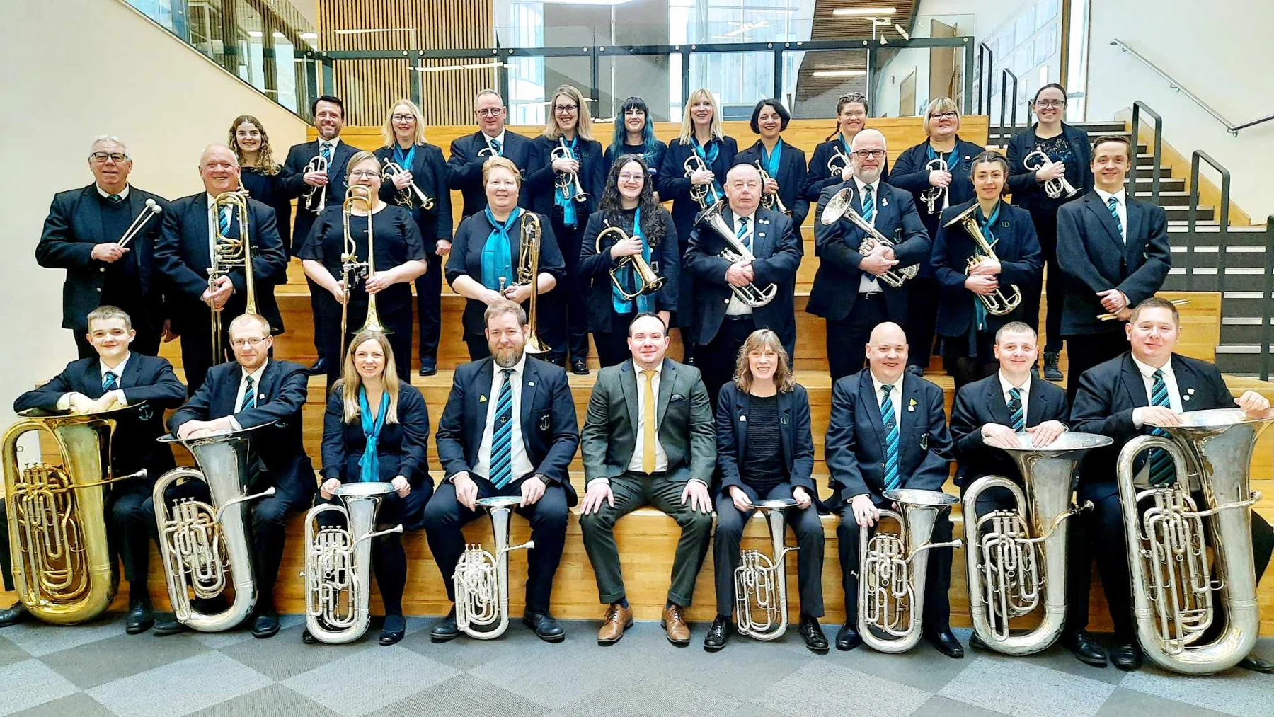 Emley Brass Band pictured together at the Yorkshire Regionals in 2024.