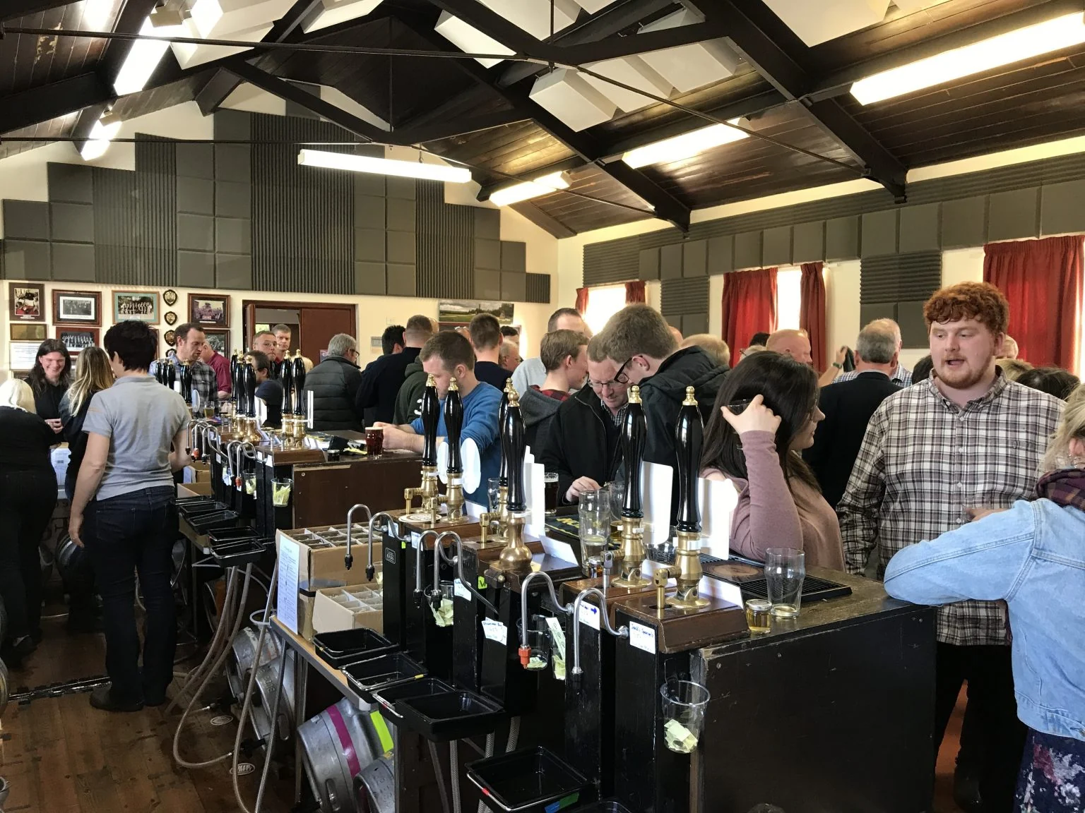 Visitors enjoying a Real Ale Festival in the Emley bandroom.