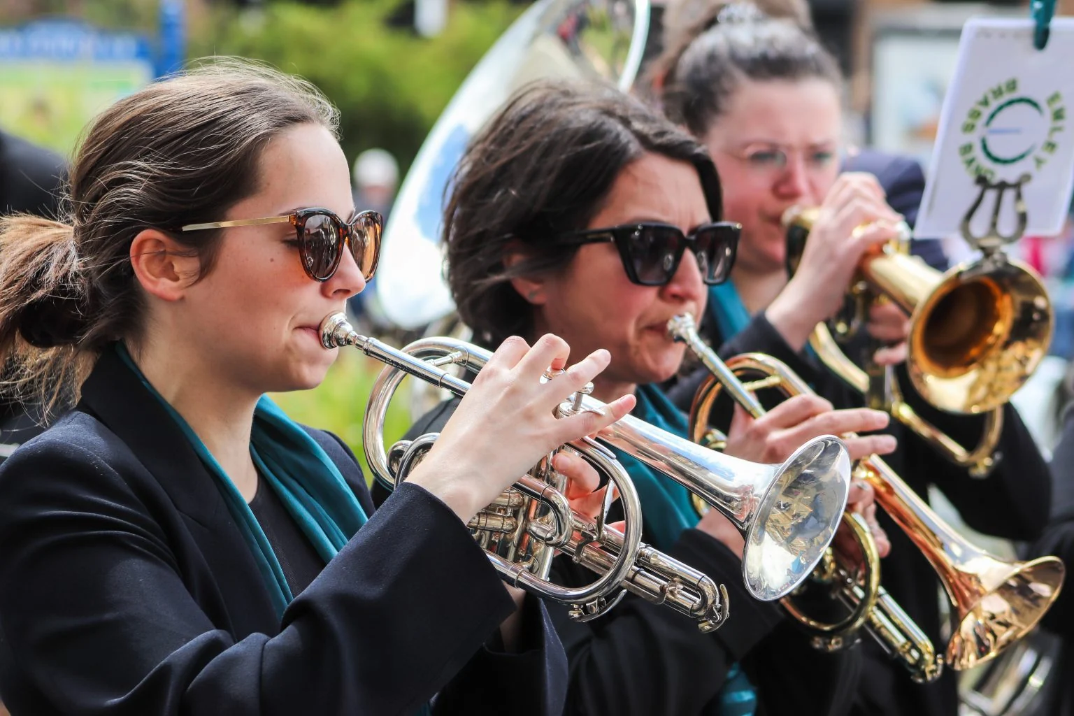 Emley cornet players performing outdoors at the Brighouse March & Hymn Contest in 2022.